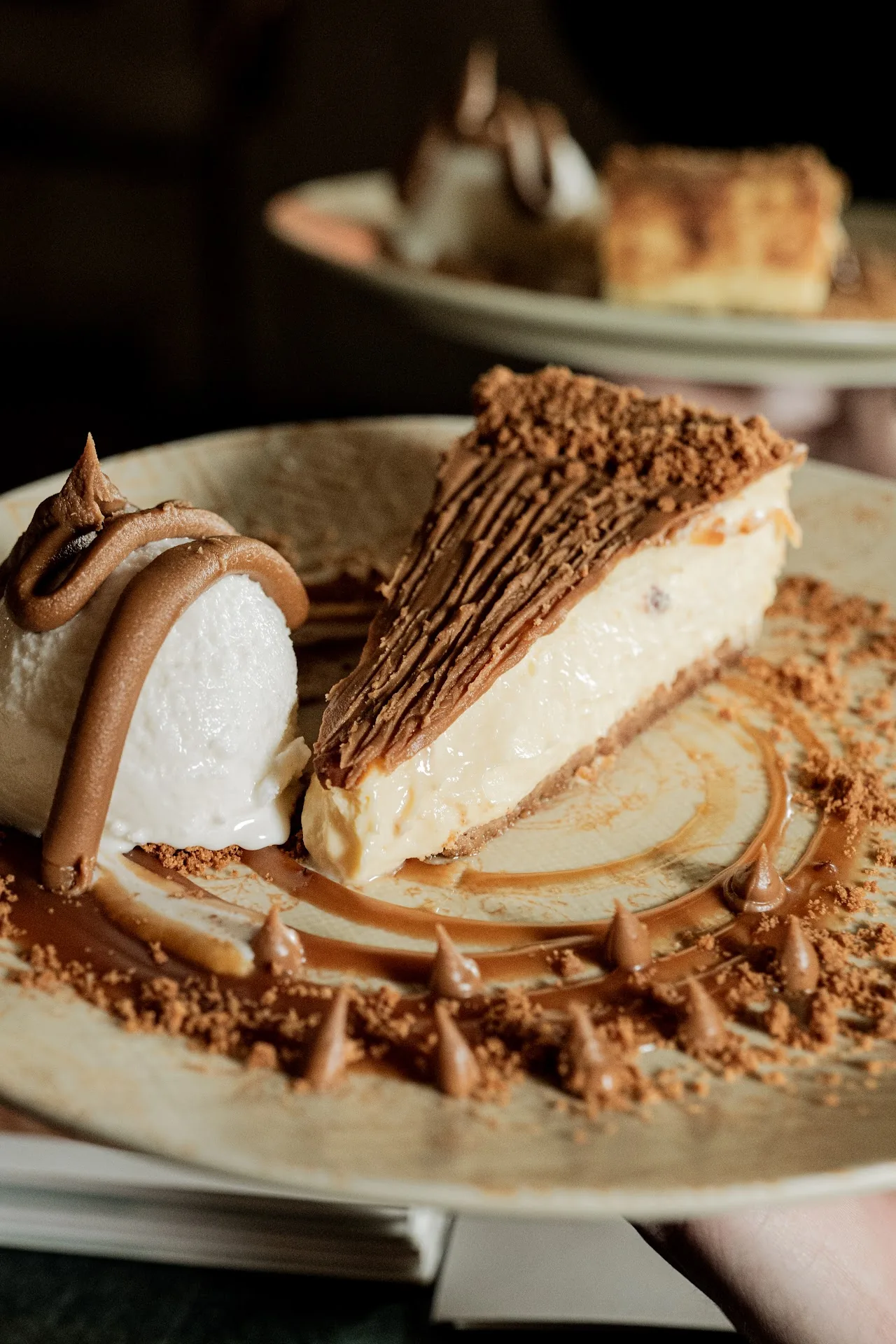 A slice of cheesecake-style dessert on a plate