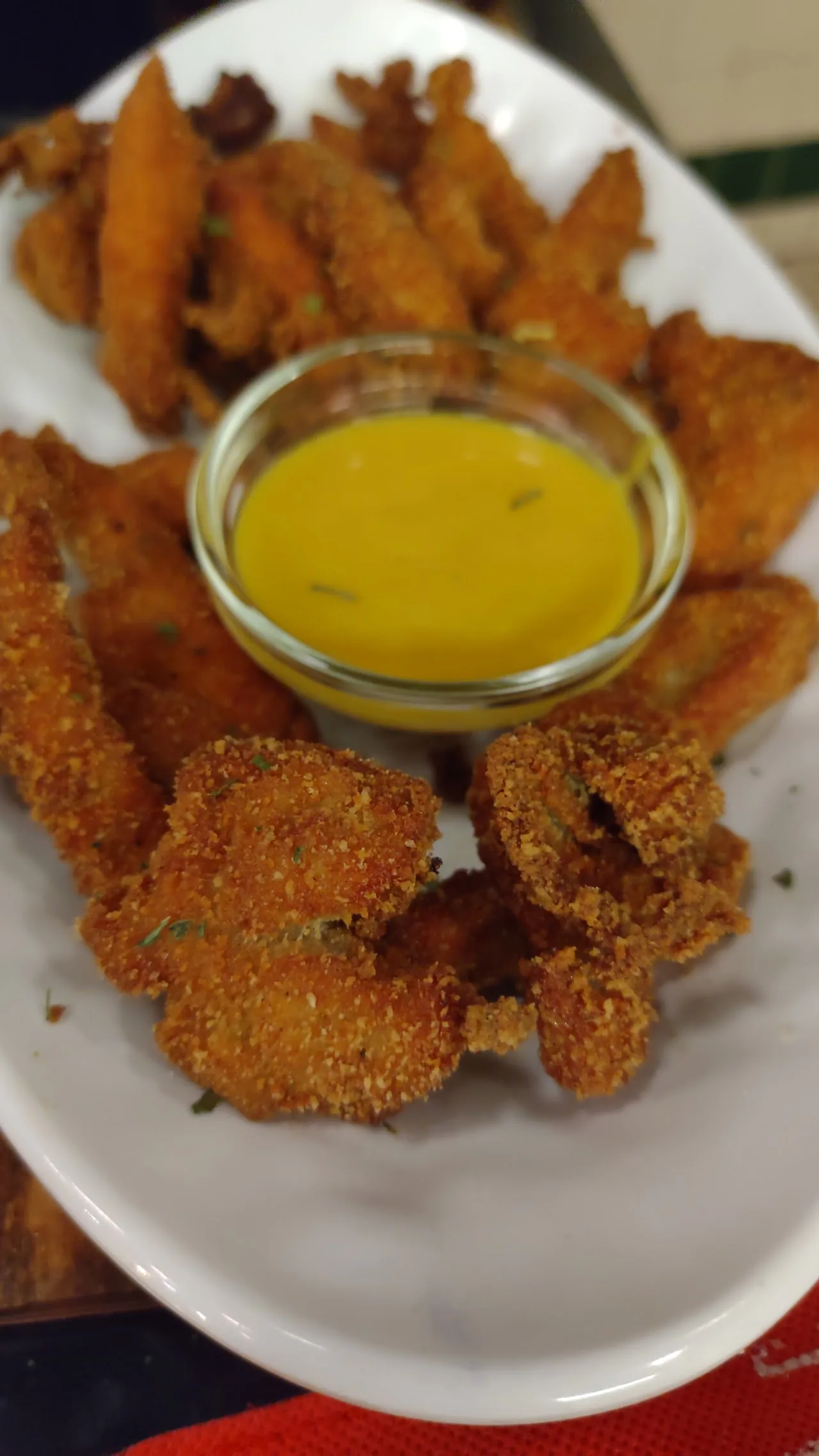 Fried chicken tenders with a dipping sauce
