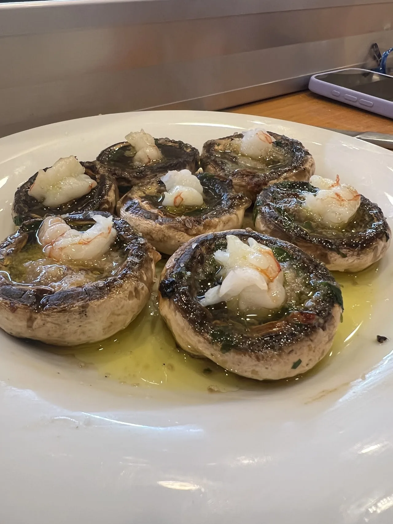 Grilled mushrooms topped with a poached quail egg