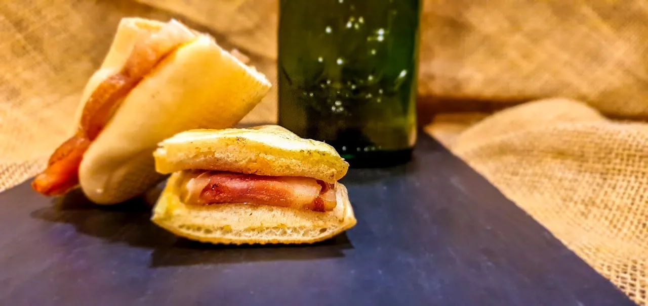 Small sandwiches with ham and cheese fillings