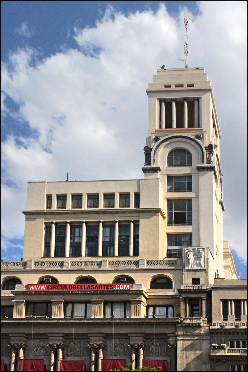 The Círculo de Bellas Artes tower with its rooftop belvedere, seen from below with the CirculoBellasArtes.com banner across the lower facade