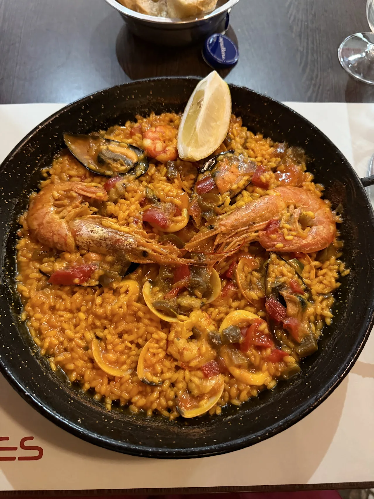 A seafood paella with shrimp and mussels