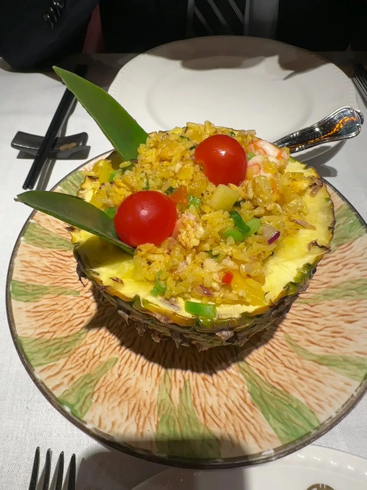 Fried rice served in a hollowed pineapple half
