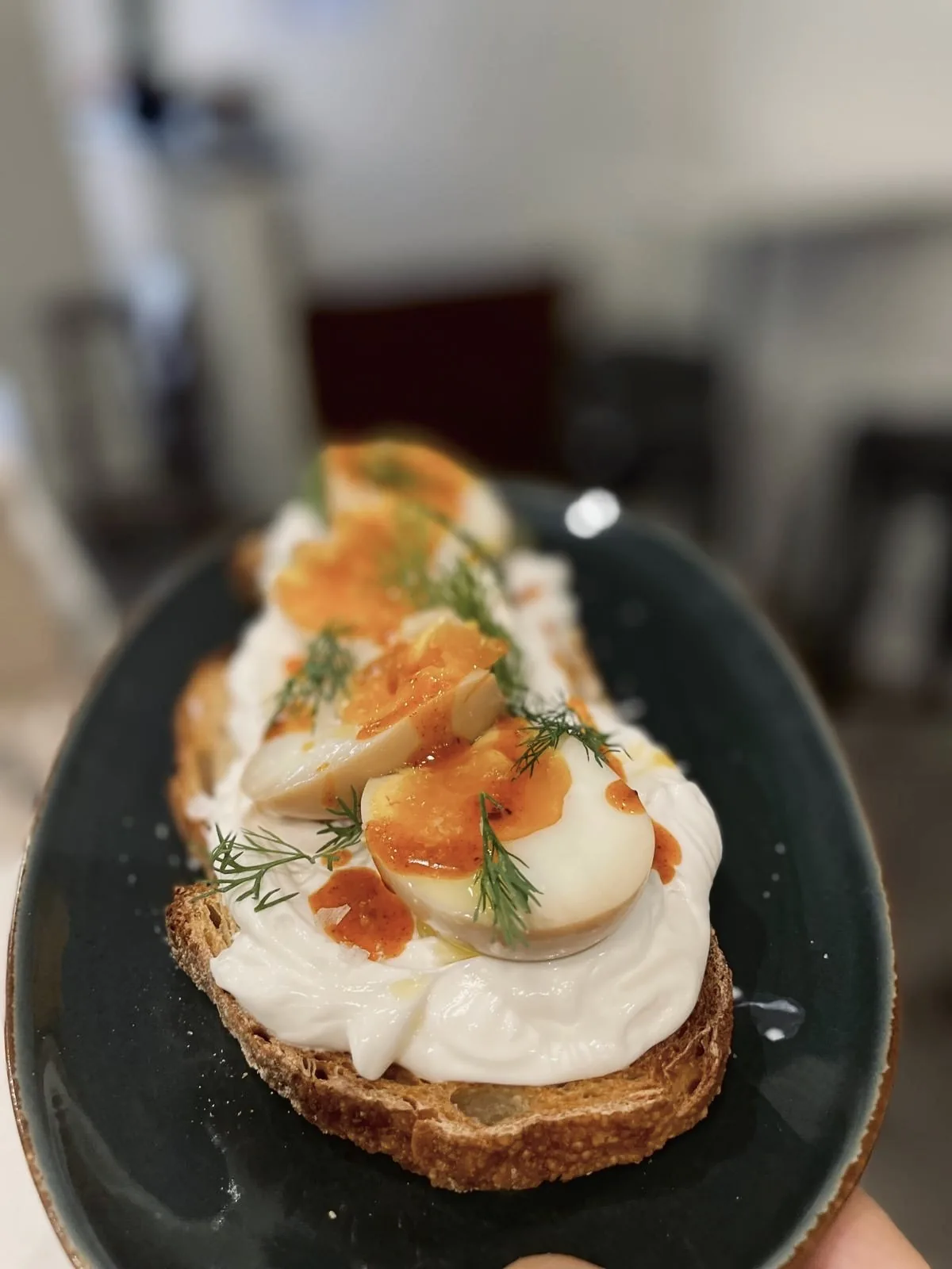 A poached egg and salmon on toast