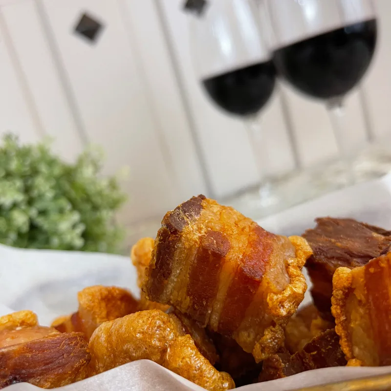 A plate of crispy fried pork belly (torreznos)