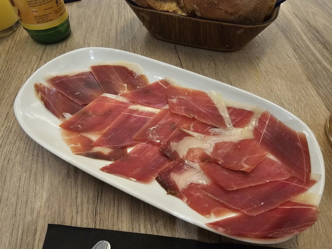 A platter of sliced jamón