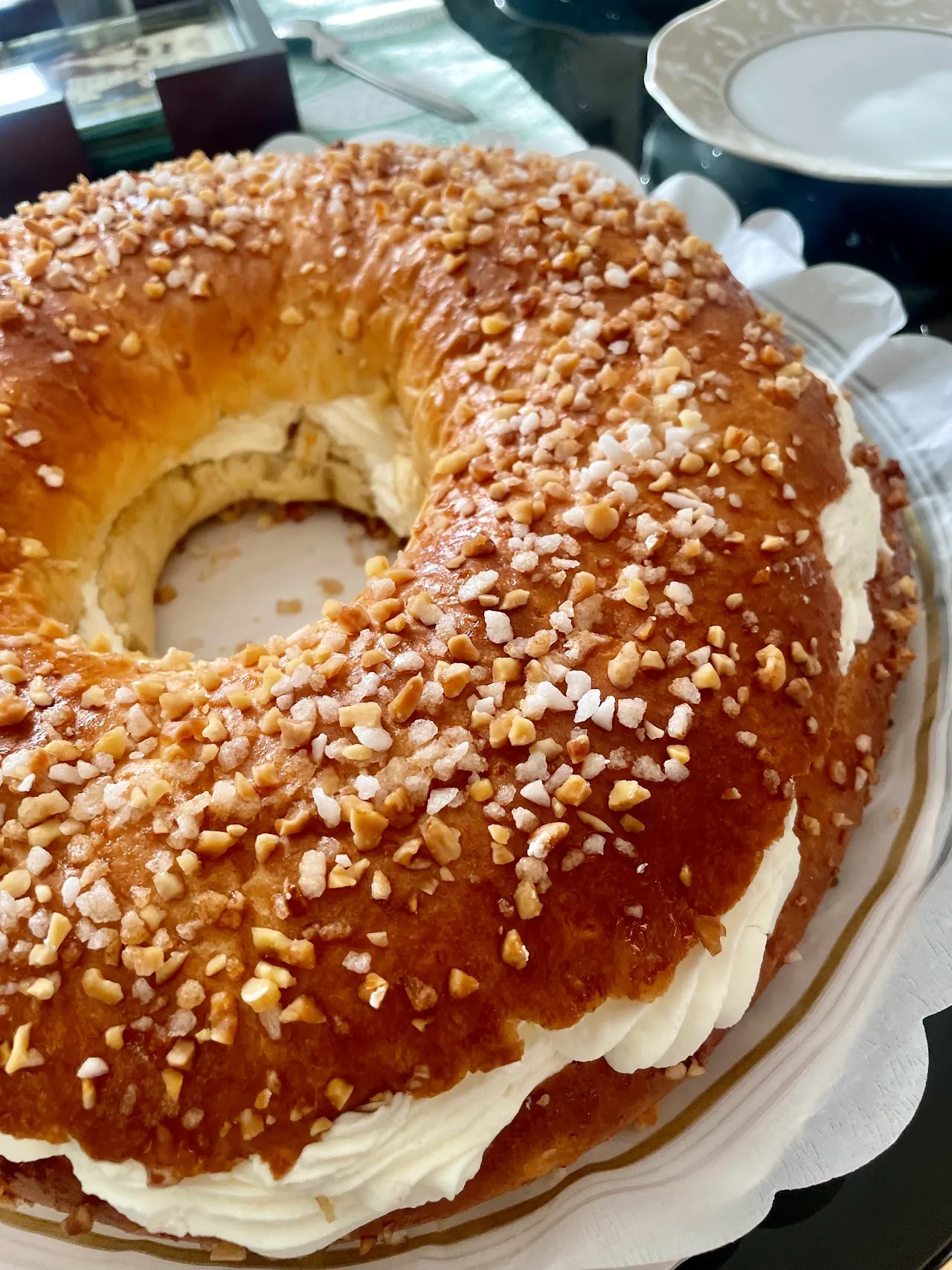 A cream-filled brioche ring topped with almonds
