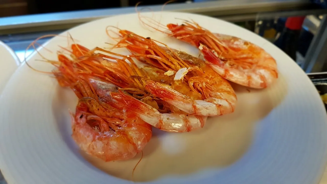 A plate of whole grilled langostinos (prawns)