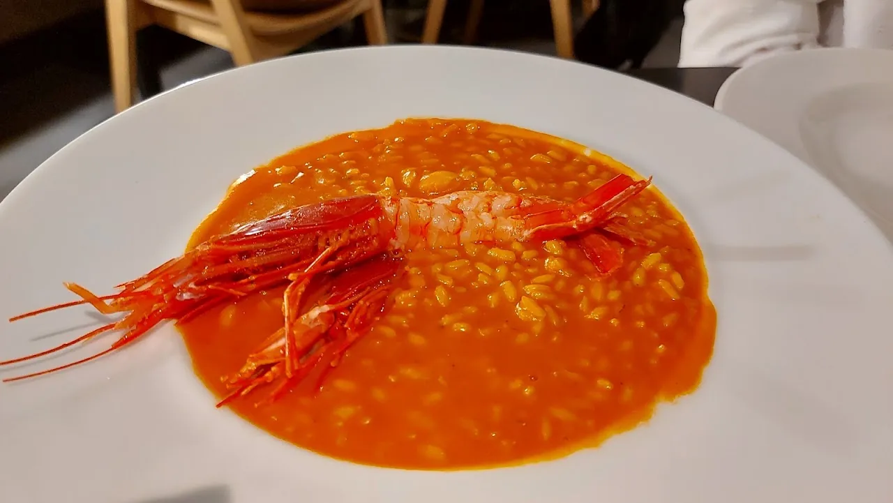 Whole prawns in an orange bisque-style sauce