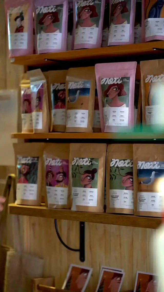 Shelves of Noti's own roasted coffee bags in the shop