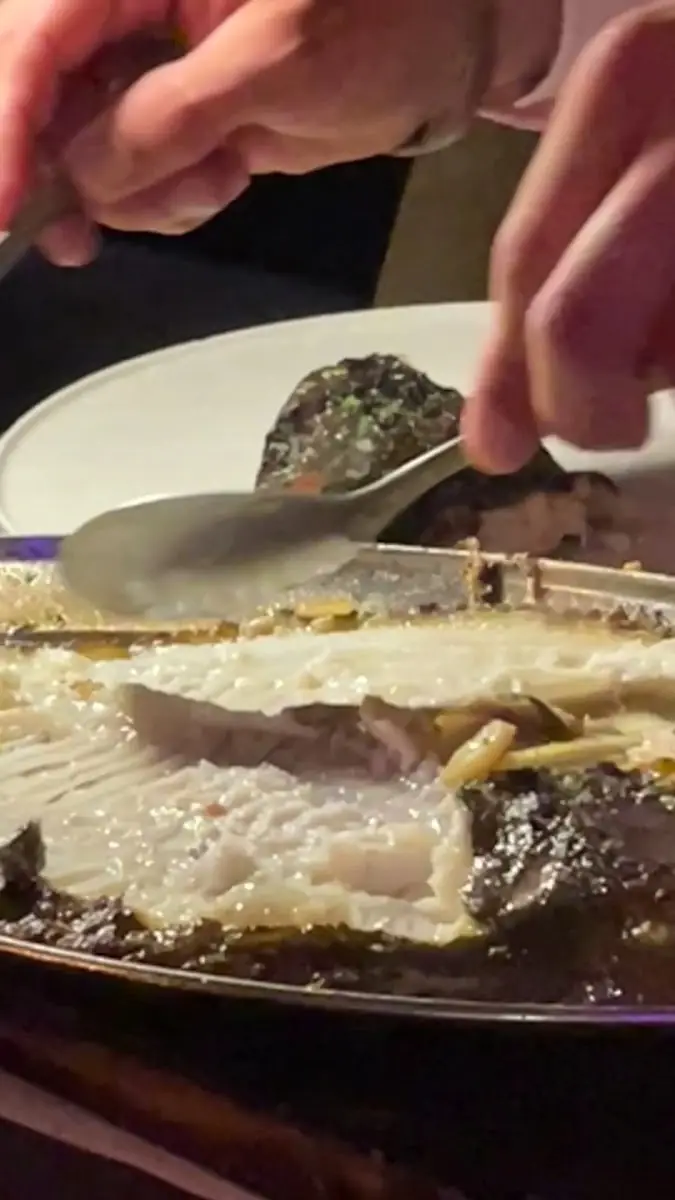 Plating a dish at Nudos Atelier