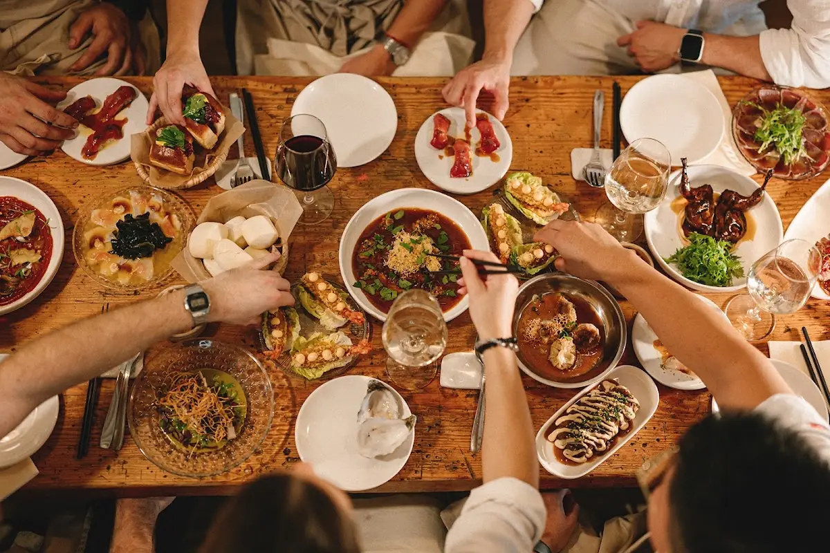 A spread of shared plates at Nus Palma