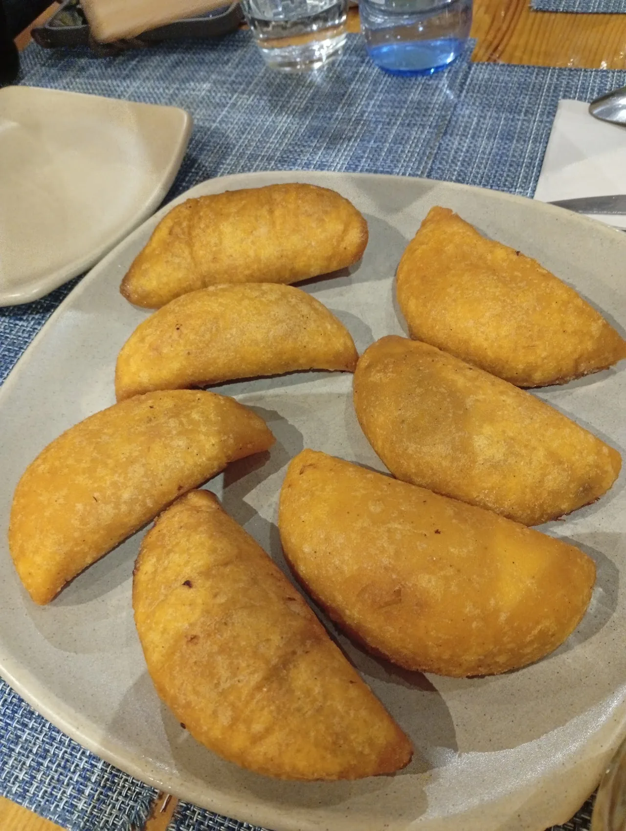 A plate of fried empanadas