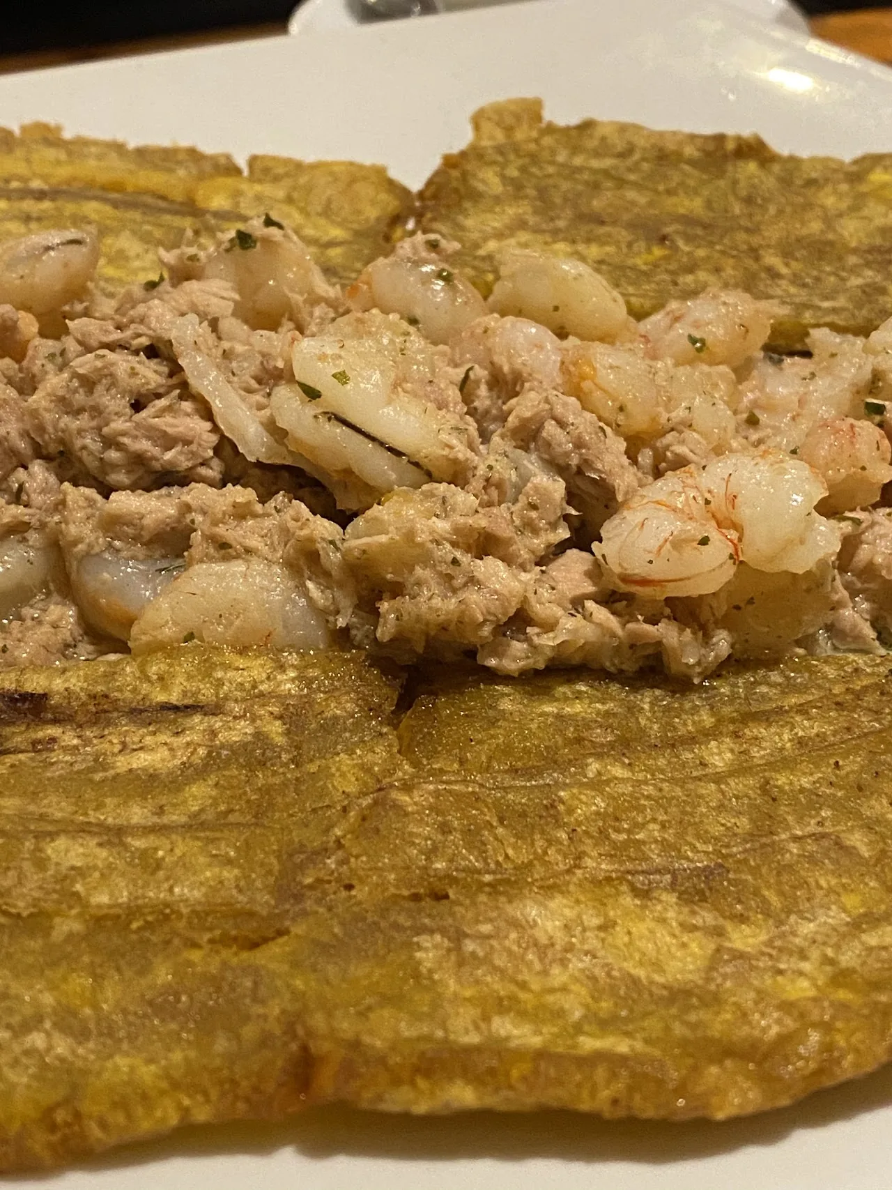 Fried green plantain slices, patacones, on a plate