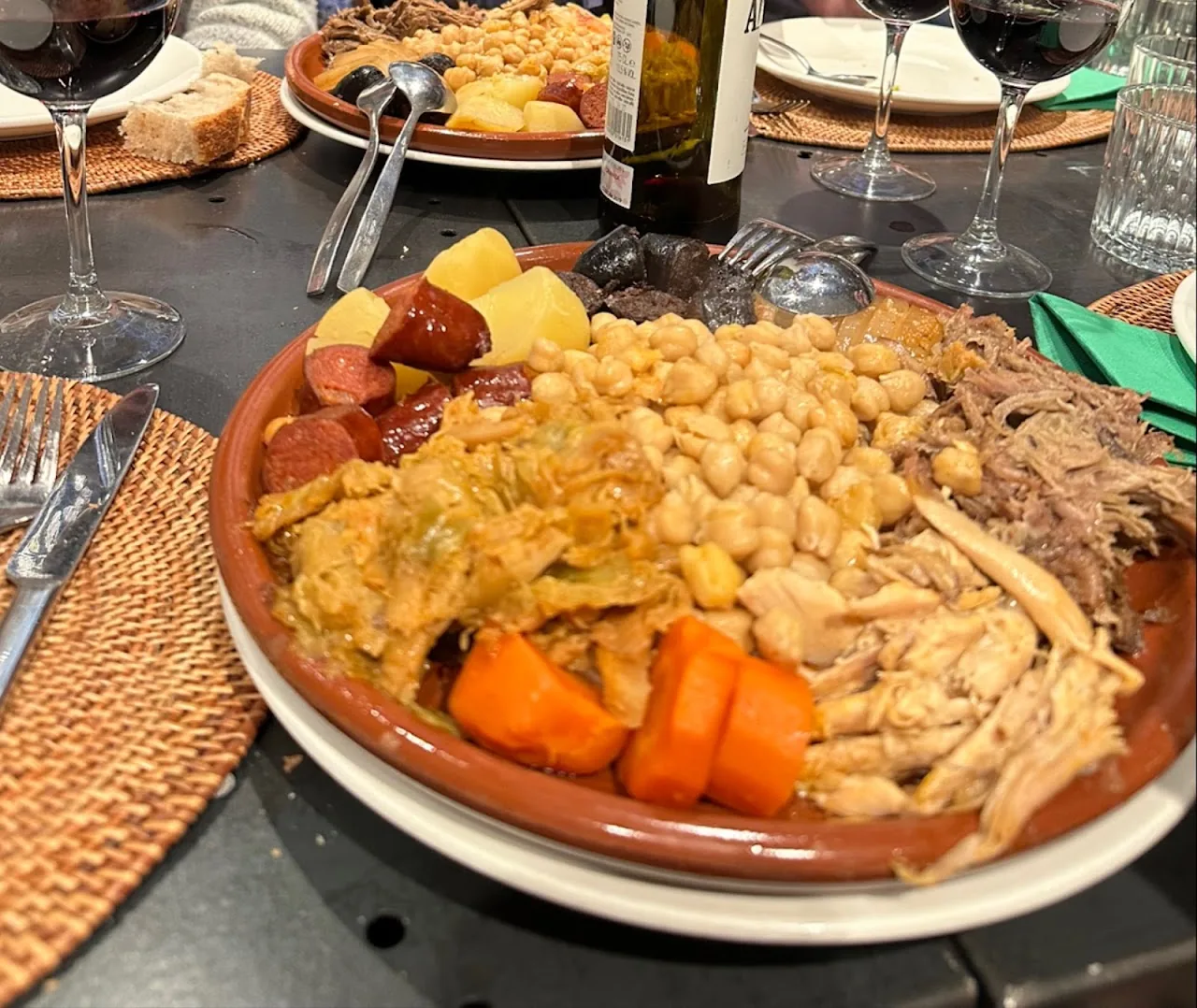 A platter of stewed chickpeas with meat and vegetables