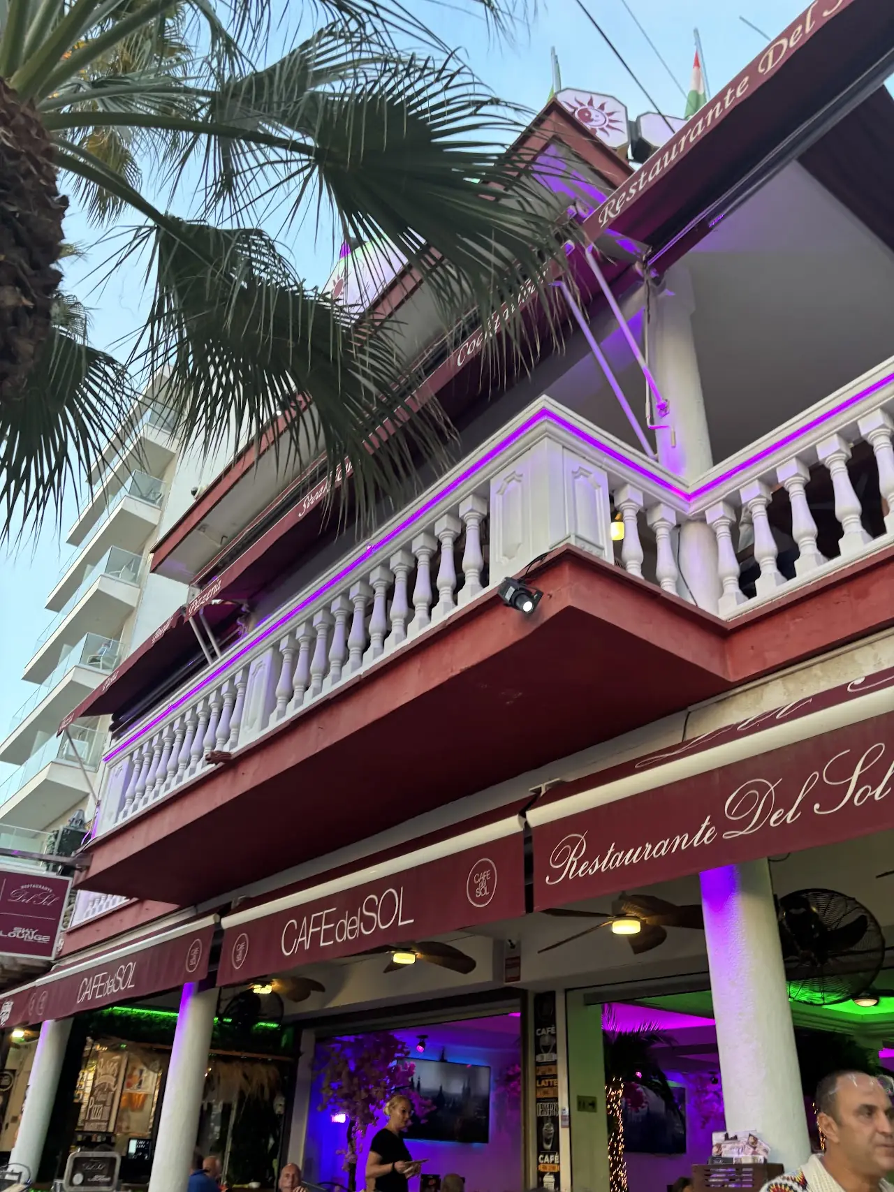 Restaurante Del Sol's pink-balconied front on Avinguda Miramar