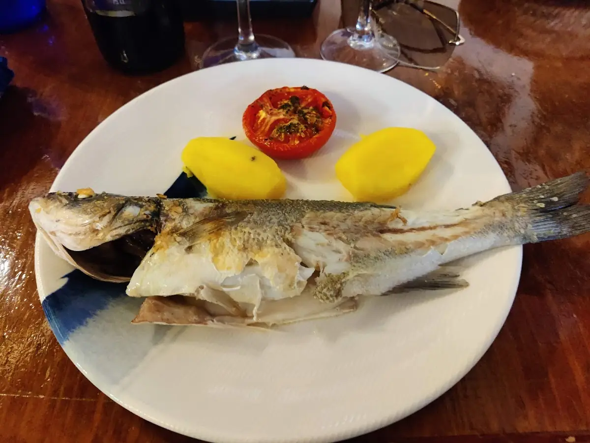 A whole grilled fish at Celler El Molí