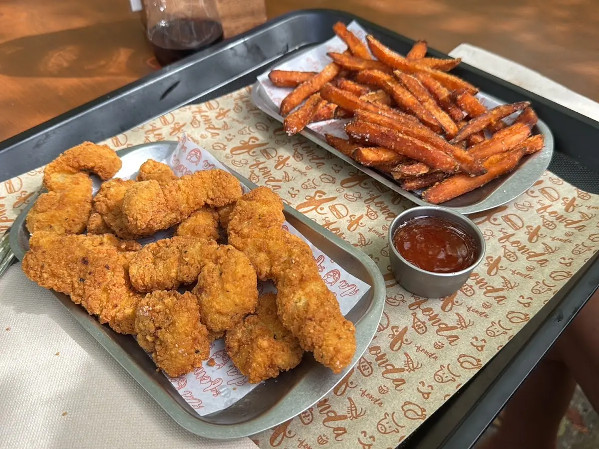 Fried chicken with sweet potato fries at Sa Fonda