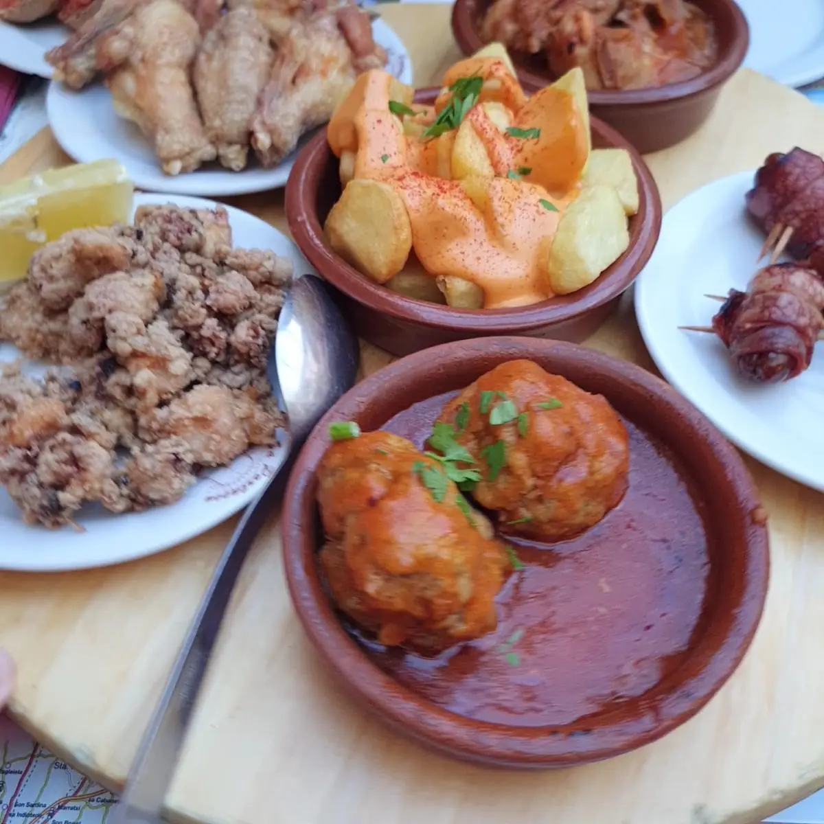 Tapas plates at Sa Portassa: croquetas, meatballs and fried squid