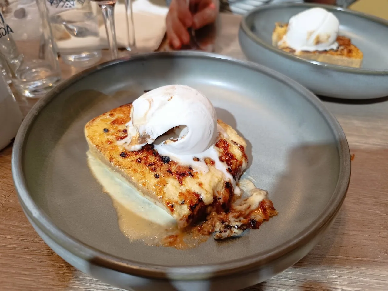 A creamy baked dessert topped with whipped cream