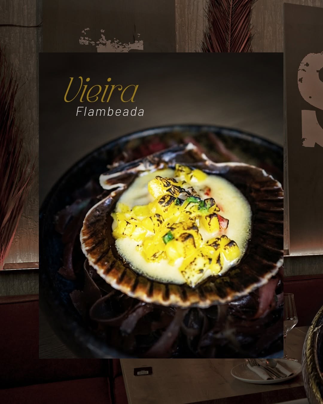 El primer pase de nuestro Menú Degustación entra así de fuerte. Vieira flambeada con el toque fresco del mango, el punch