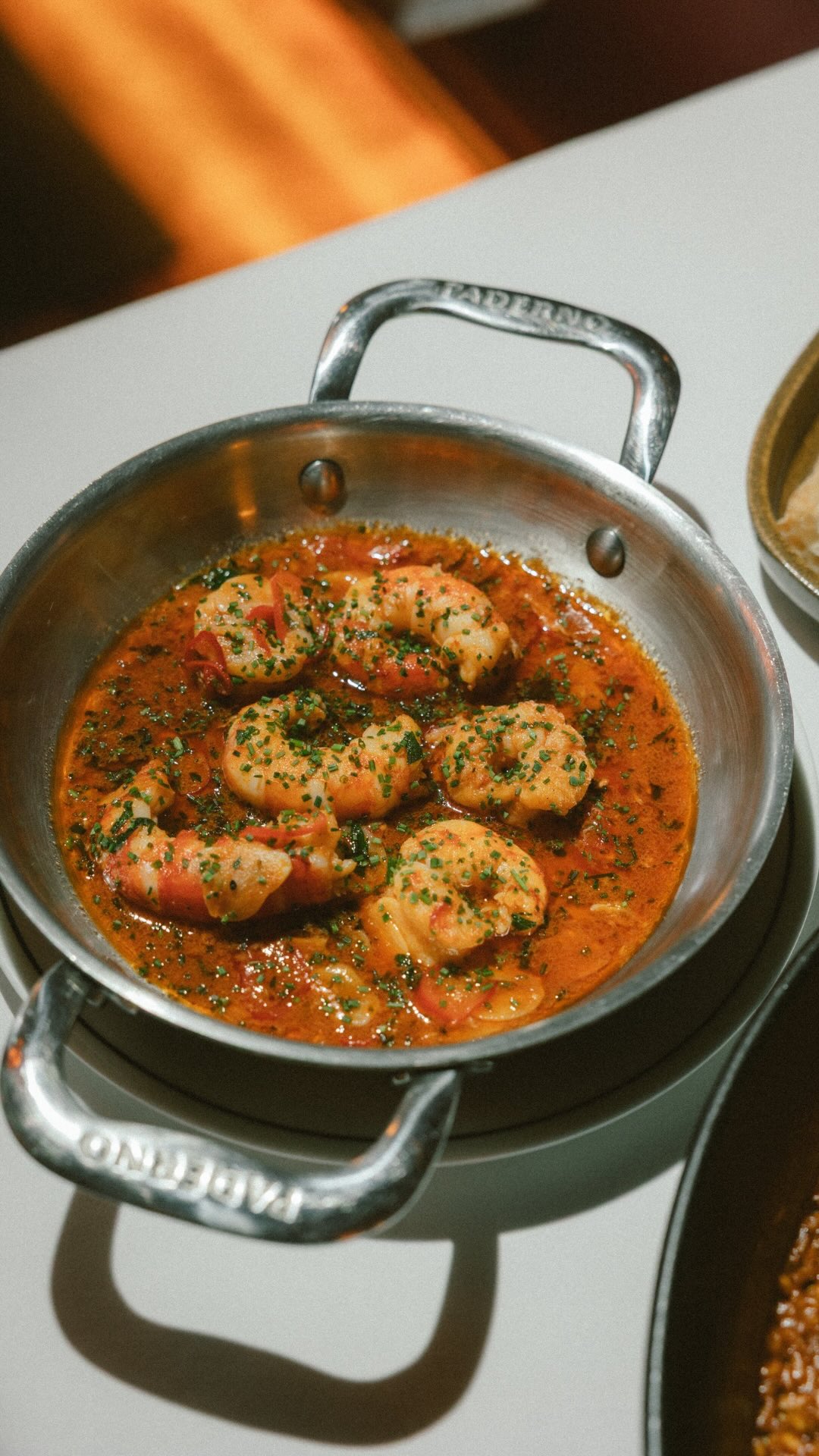 Garlic, olive oil, chilli, plump prawns – then straight into the heat until everything starts to sizzle. Gambas al ajill