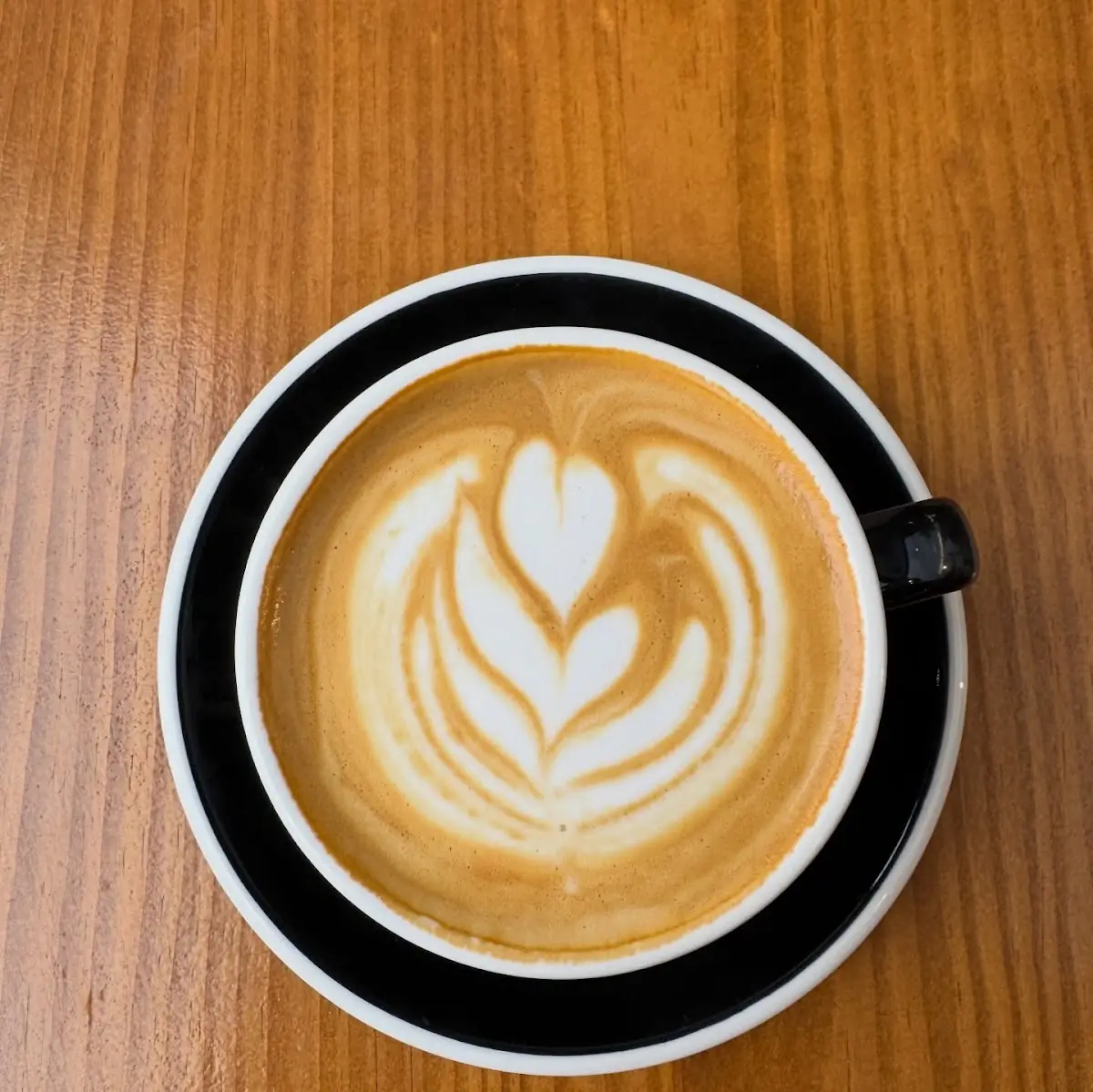 A flat white at The Barn Coffee Roasters