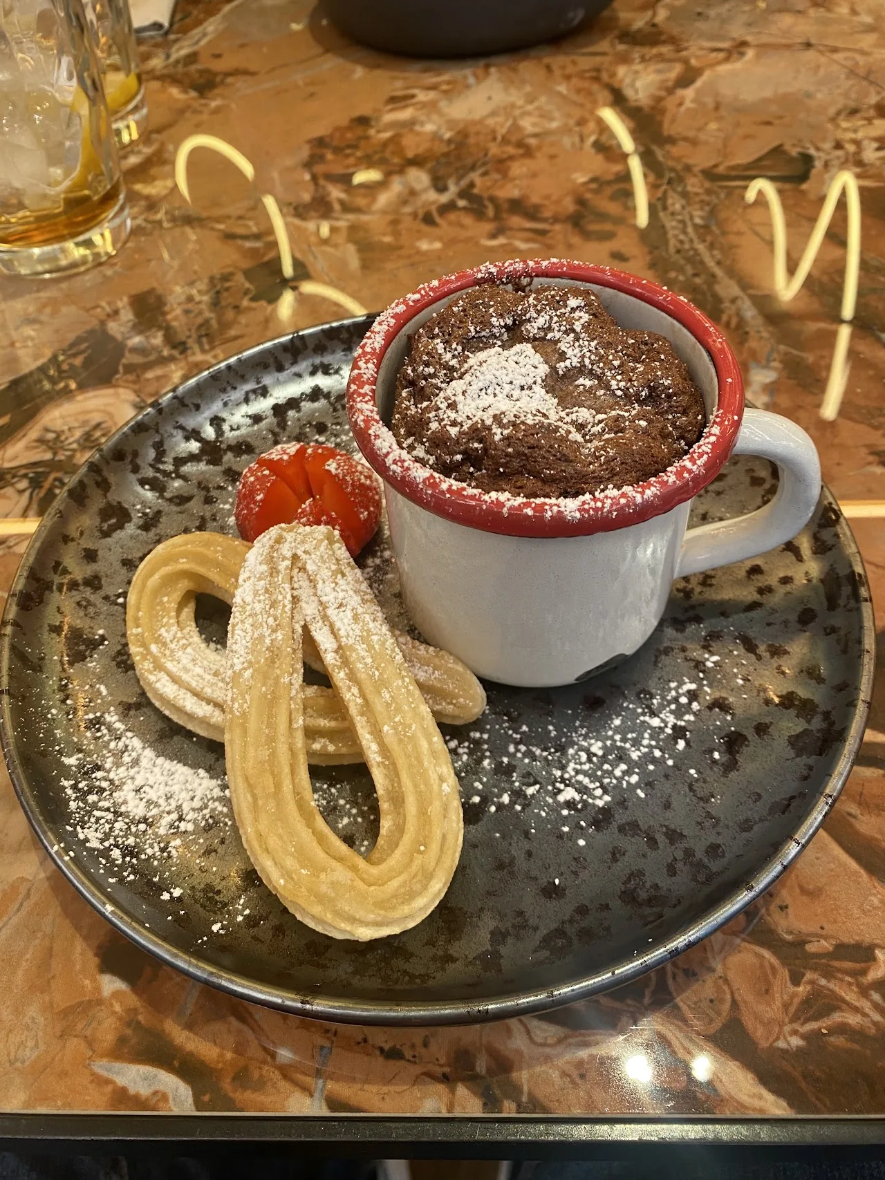 Churros with a cup of hot chocolate for dipping