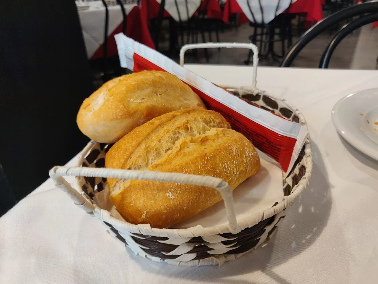 A basket of fresh bread rolls