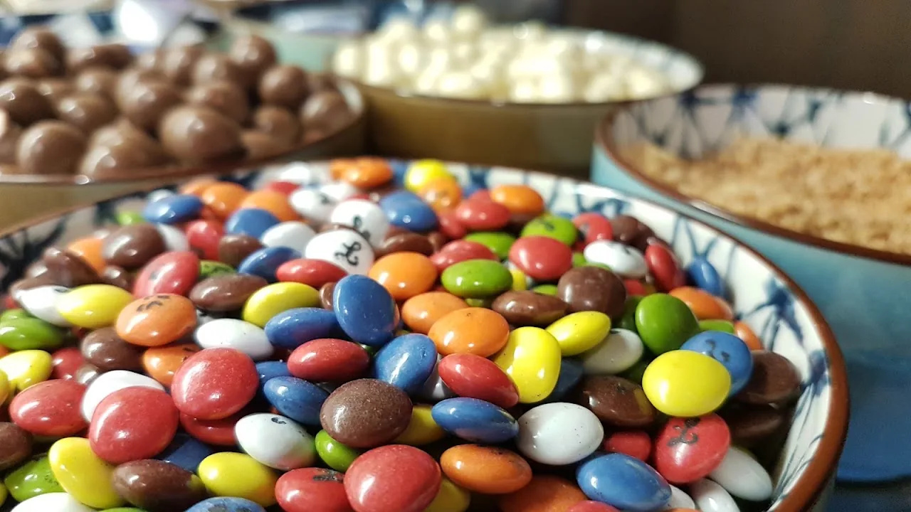A bowl of colorful candy-coated chocolates