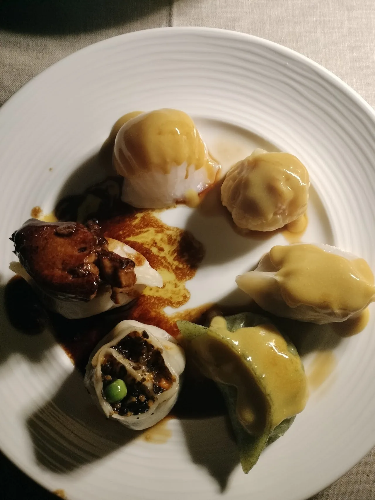 A plate of assorted dumplings