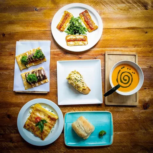A platter of assorted tostas and crostini