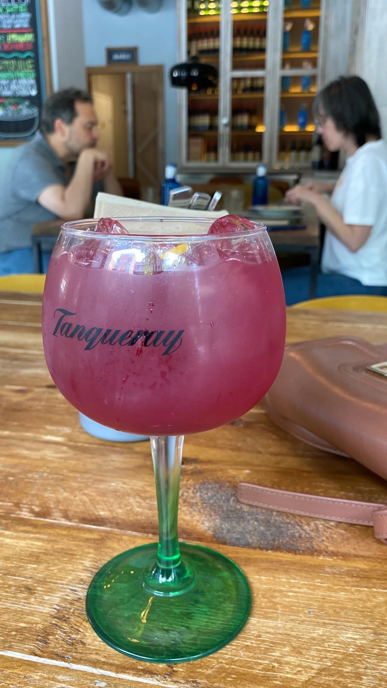 A pink cocktail in a stemmed glass